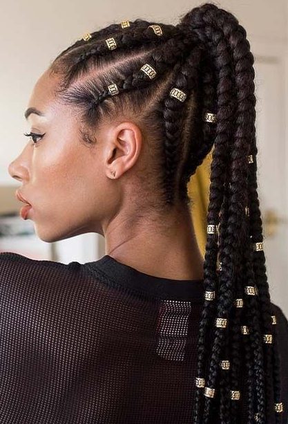 Braided Ponytail With Gold Braid Cuffs
