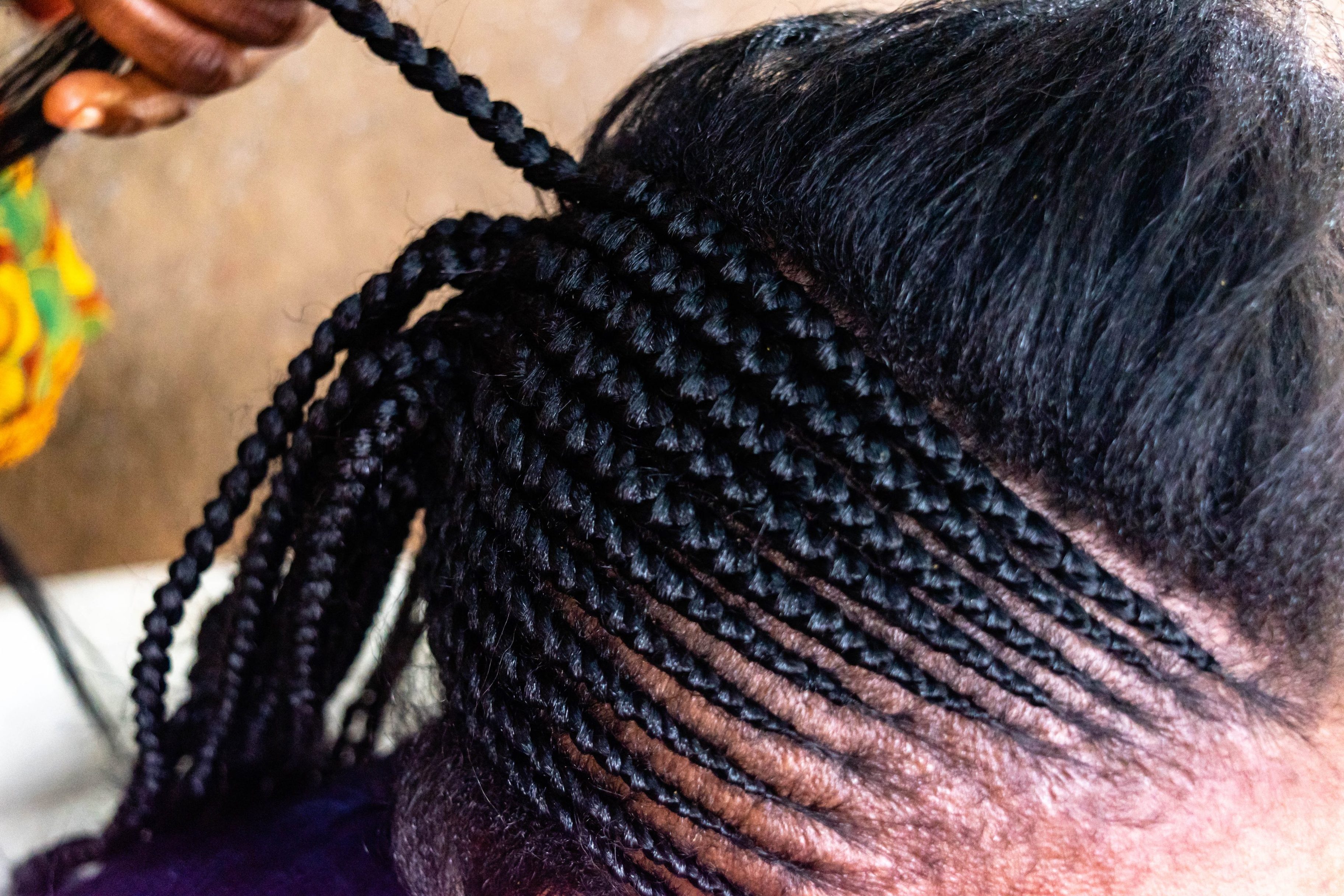 Dynamic Side-Swept Cornrows